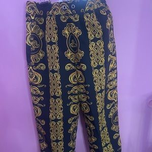 Black and gold sweat type pants